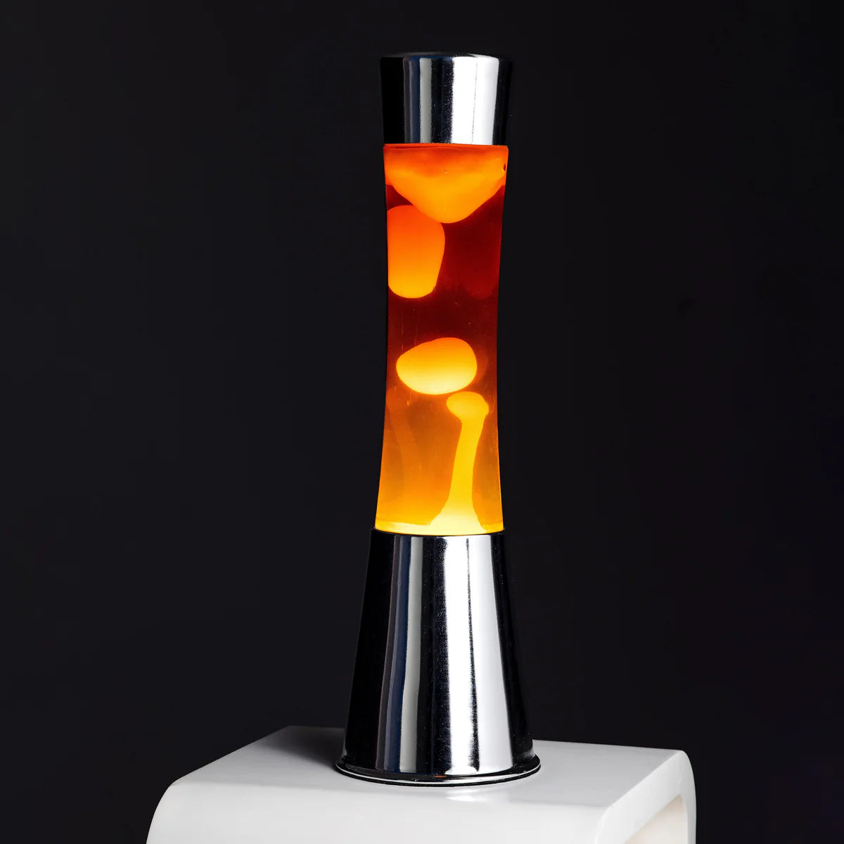 Orange lava lamp - chrome base - transparent liquid - 40 cm | Fisura - de inKijk