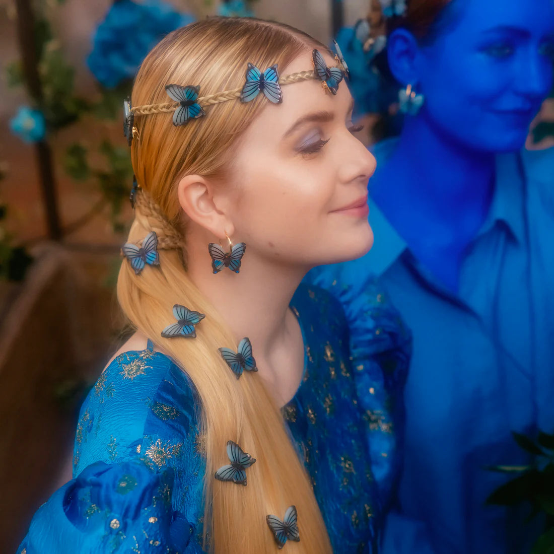 blue butterfly hair clips in blonde hair