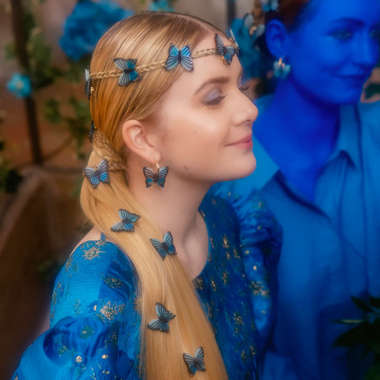 blue butterfly hair clips in blonde hair